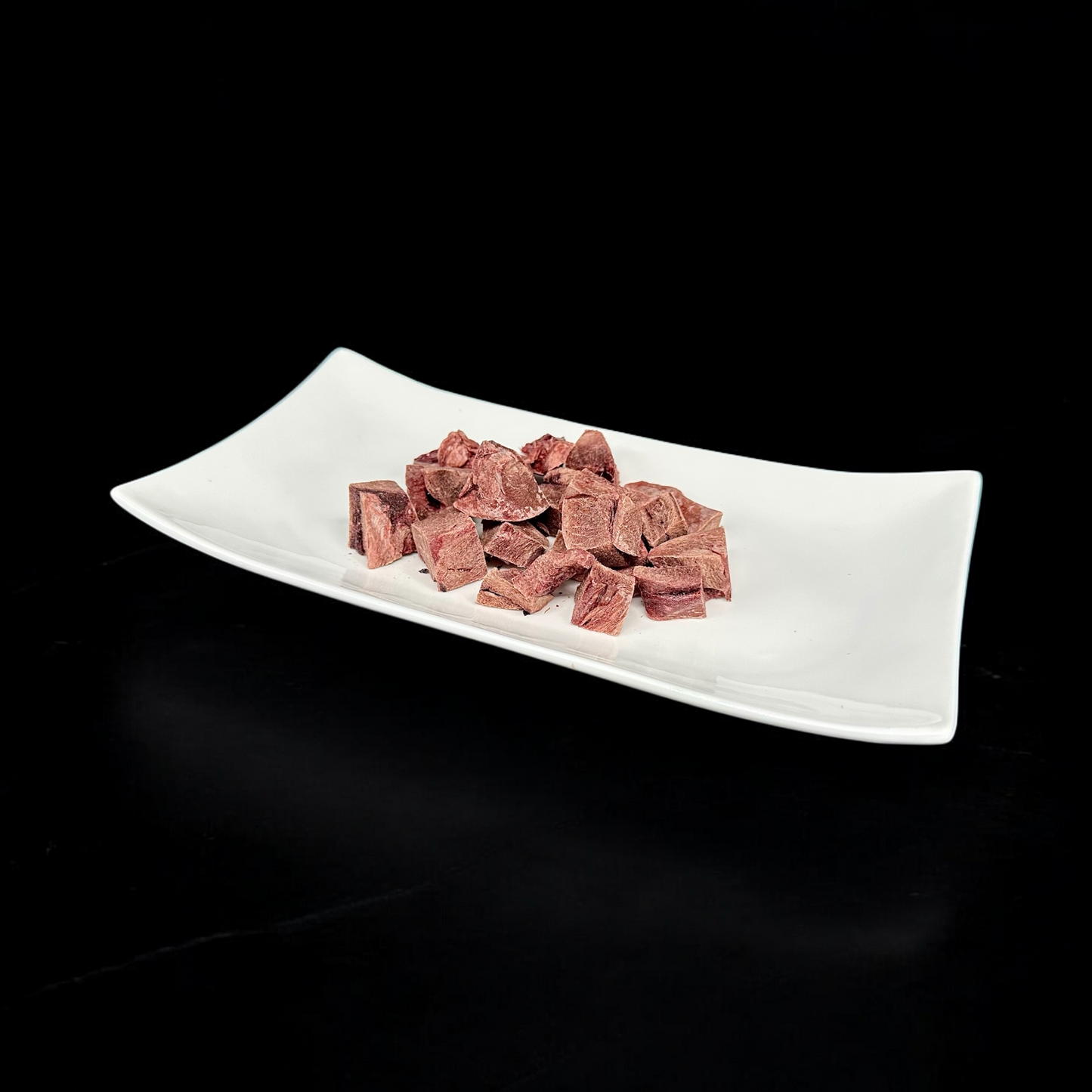 Gefriergetrocknetes Känguru Herz in Würfel für Hunde und Katzen – BARF – Leckerli - Snack, schonend gefriergetrocknet. Hypoallergen. Vitacanin Schweiz.